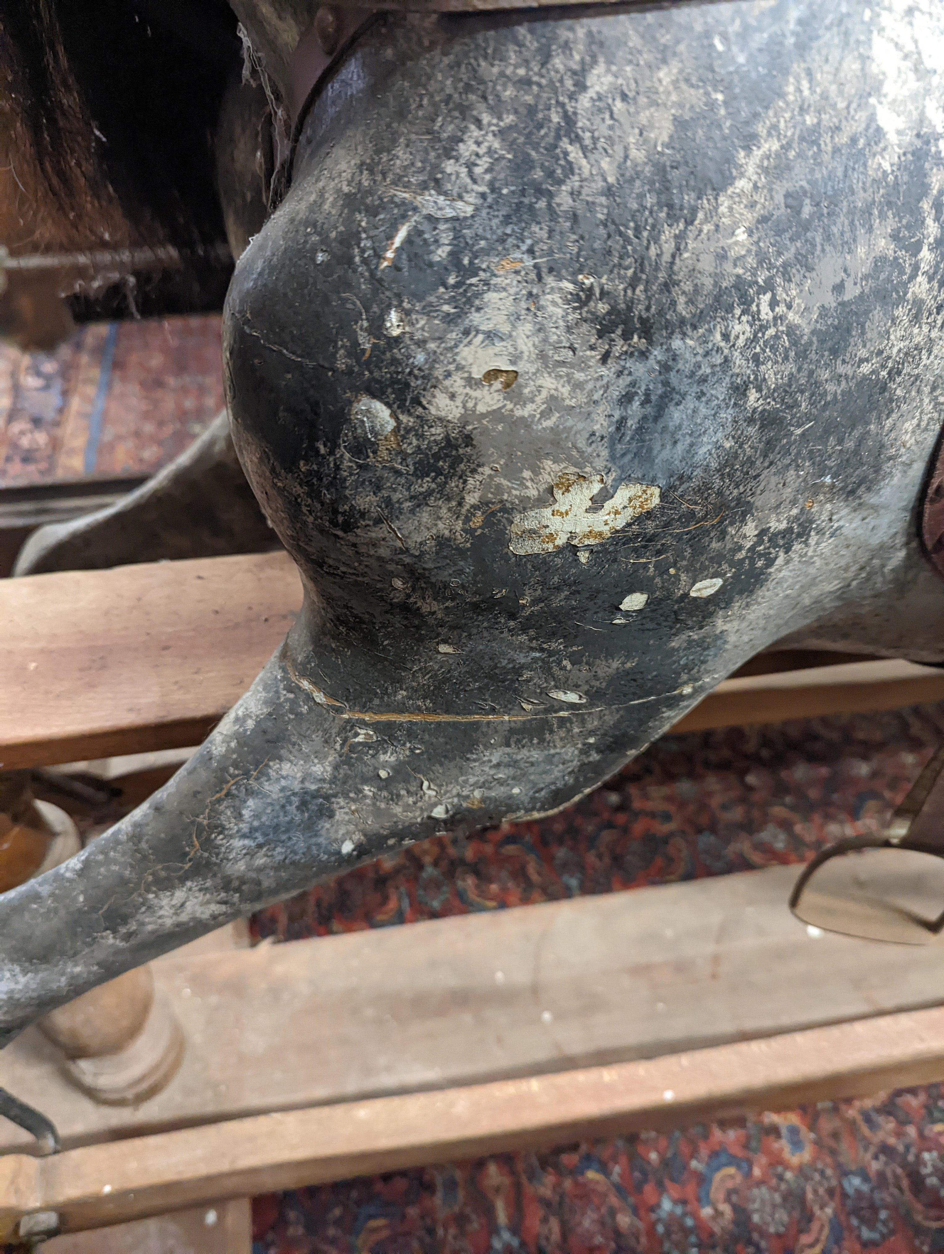 A large Edwardian Ayres type rocking horse on a turned safety frame, length 160cm, height 110cm